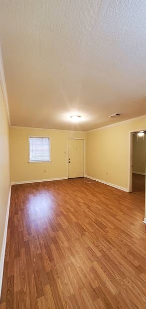 Hattiesburg apartment for rent - an empty living room with a hard wood floor