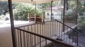 Seminary house for rent - a view of a porch with stairs and a deck