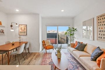 Los Angeles apartment for rent - the living room and dining area of an apartment with a couch and a table
