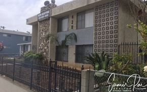 Inglewood apartment for rent - a house with a wrought iron fence in front of it