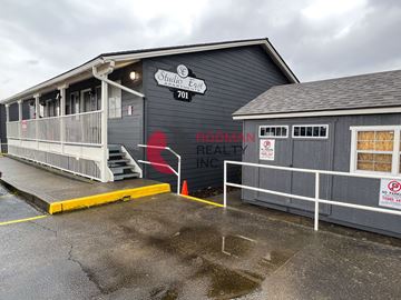Kelso apartment for rent - A building with a sign that says "Studio East" and the number "701" on it.