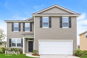 Jacksonville house for rent - A two-story house with a garage is for sale by FirstKey Homes.