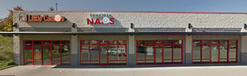 Comstock Park apartment for rent - the front of a restaurant with red doors and windows