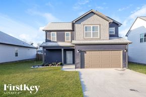 Clarksville house for rent - A two-story house with a garage is for sale by FirstKey Homes.