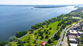 Montréal apartment for rent - A large body of water with a landmass on the other side.