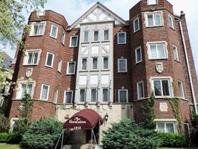 Louisville apartment for rent - The building is called The Carlton and it is a large red brick building.