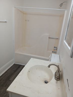 Louisville apartment for rent - an empty bathroom with a sink and a shower