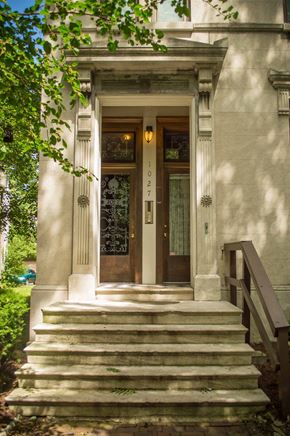 Louisville apartment for rent - the front of a house with stairs and a door