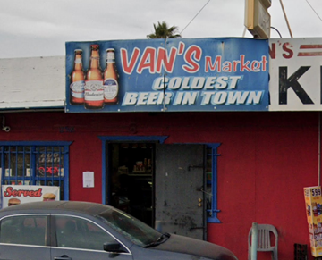 Tulare apartment for rent - A red building with a sign that says "Van's Market" and "Coldest Beer in Town."