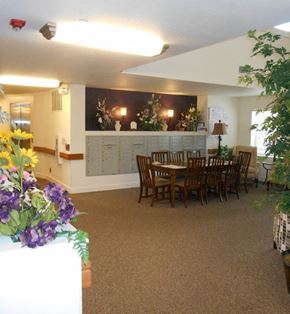 Butte apartment for rent - a dining room with a table and chairs