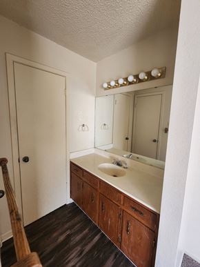 Killeen apartment for rent - A bathroom with a sink and mirror.