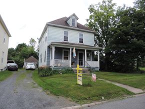 Stellarton apartment for rent - a house with a yellow sign in front of it
