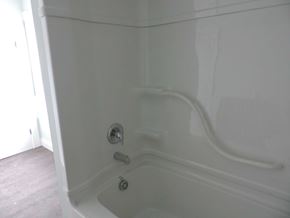 Stellarton apartment for rent - a white bath tub in a bathroom with white walls