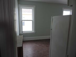 Stellarton apartment for rent - a small room with a refrigerator and a window