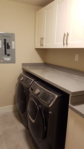 Vancouver apartment for rent - A washer and dryer in a laundry room.