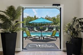 Lake Oswego apartment for rent - Apartments Lake Oswego for Rent - Westlake Meadows - An Exterior Shot Of The Swimming Pool Surrounded By Lounge Chairs And Umbrellas