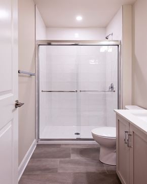 Ottawa apartment for rent - a small bathroom with a shower and a toilet