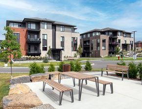 Ottawa apartment for rent - two benches and a table in front of some apartment buildings