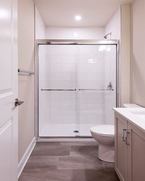 Ottawa apartment for rent - a small bathroom with a shower and a toilet