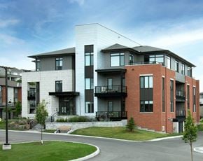Ottawa apartment for rent - a rendering of a new apartment building on a street corner
