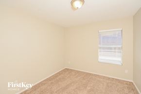 Princeton house for rent - the spacious bedroom has carpeted floors and a window