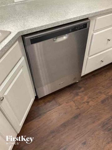 Charlotte house for rent - A dishwasher is built into a kitchen counter.