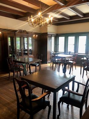 Toronto apartment for rent - a dining room with tables and chairs and a chandelier