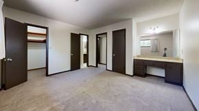Tulsa apartment for rent - A spacious room with a sink and mirror.