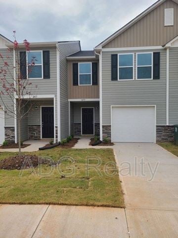 Newton house for rent - a two story house with a sidewalk in front of it