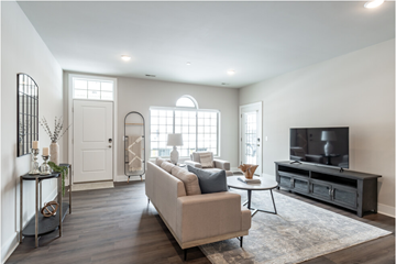 Auburn Hills apartment for rent - a living room with a couch and a tv