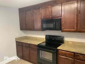 Bethlehem house for rent - a kitchen with a stove and a microwave