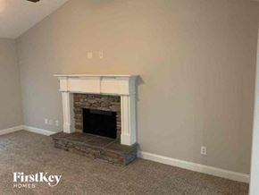 Bethlehem house for rent - a living room with a stone fireplace