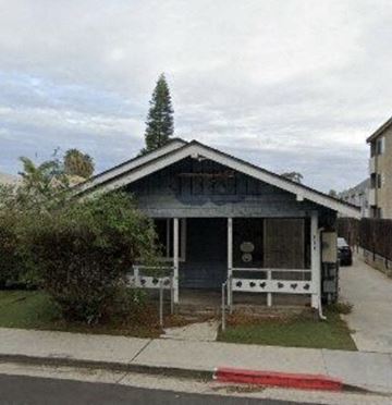 San Diego apartment for rent - a small house with a porch and a tree on top of it