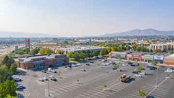 American Fork apartment for rent - A parking lot with a mountain in the background.