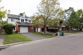 Ottawa apartment for rent - the front of a house with a street in front of it