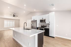 Glendale house for rent - A modern kitchen with a large island and stainless steel appliances.