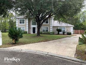 Jacksonville house for rent - a white house with a tree in front of it