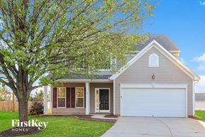 Lexington house for rent - a house with a tree in front of it
