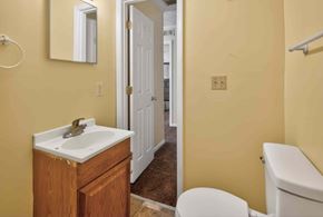 Forsyth apartment for rent - A bathroom with a sink, toilet and bathtub.