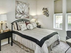 Palo Alto house for rent - a bedroom with a bed and two windows