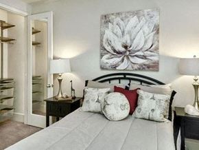 Palo Alto house for rent - a bedroom with a bed and a painting of a flower