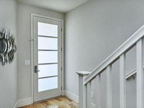 Palo Alto house for rent - a white door in a room with a staircase