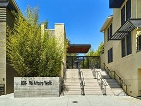 Palo Alto house for rent - a building with stairs and a tree in front of it