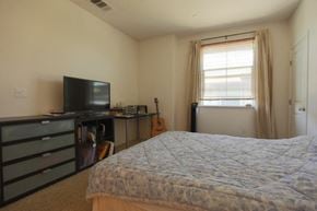 San Jose house for rent - a bedroom with a bed and a television