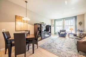 San Jose house for rent - a living room and dining room with a table and chairs