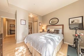 San Jose house for rent - a bedroom with a bed and a bike in it