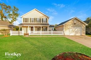 Summerville house for rent - A house with a white picket fence is for sale by FirstKey Homes.