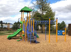 Eugene apartment for rent - a playground at a park with a swing set