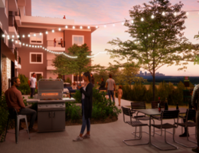 Blue Springs apartment for rent - a patio with tables and chairs and a grill at dusk