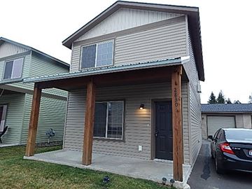 Coeur D Alene house for rent - a house with a car parked in front of it